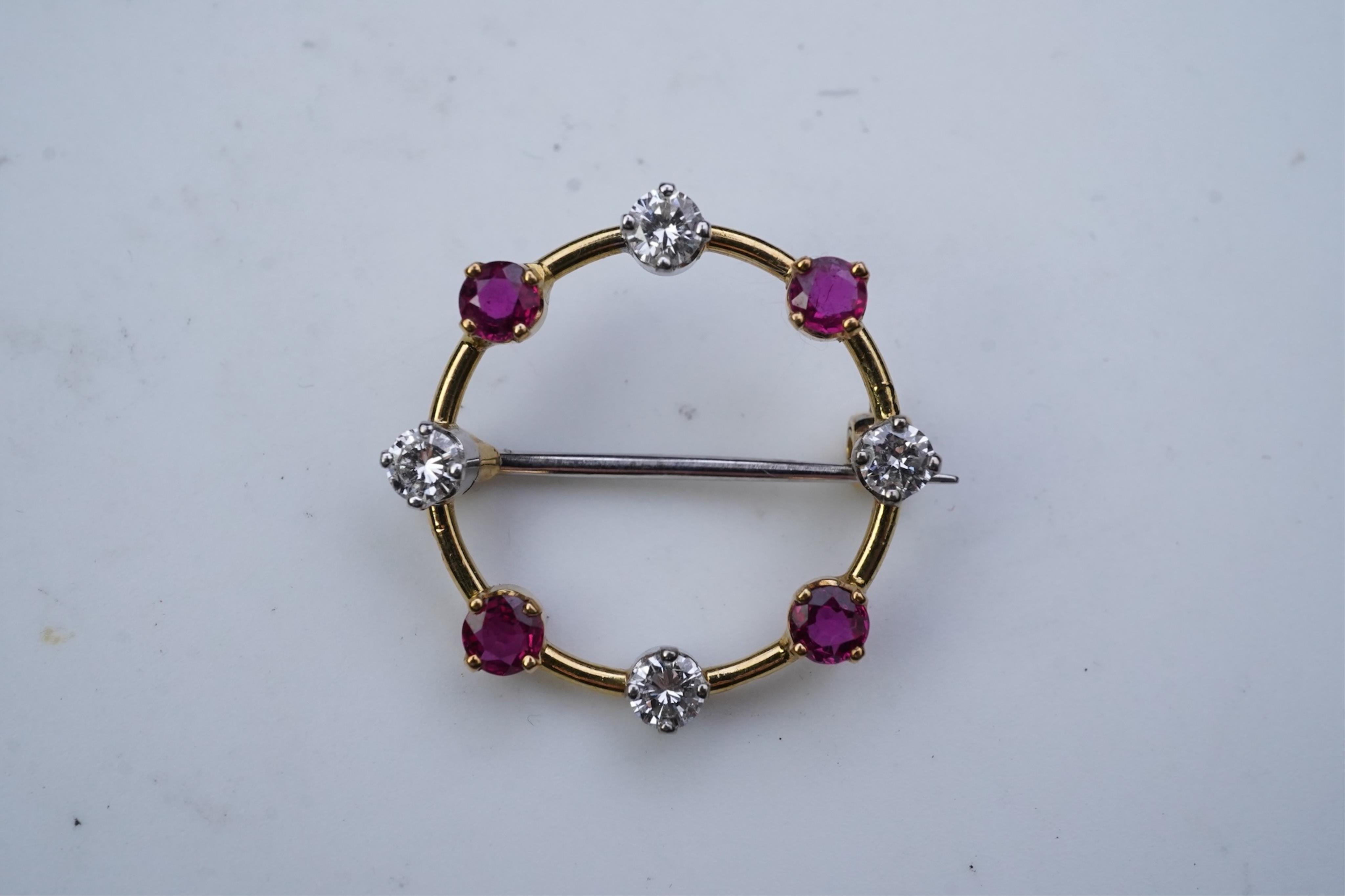 A ruby and diamond brooch